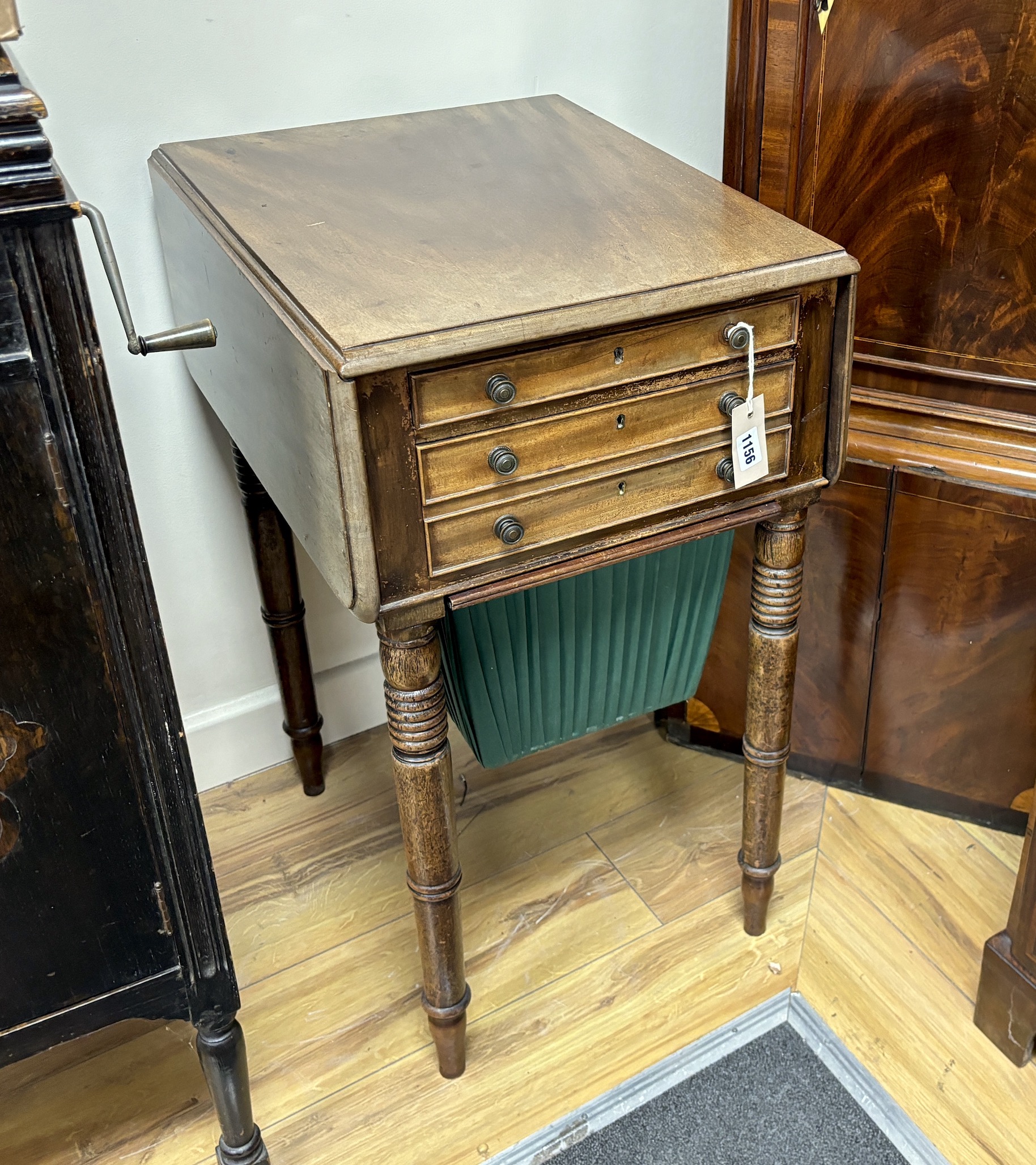 A Regency mahogany drop leaf work table, width 41cm, depth 52cm, height 75cm